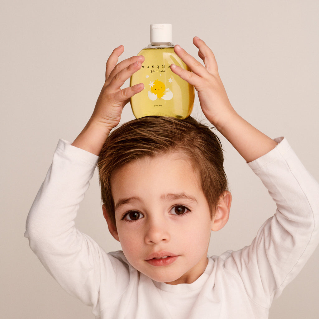 Bambino con l'olio idratante per neonati e bambini - Elixir Baby